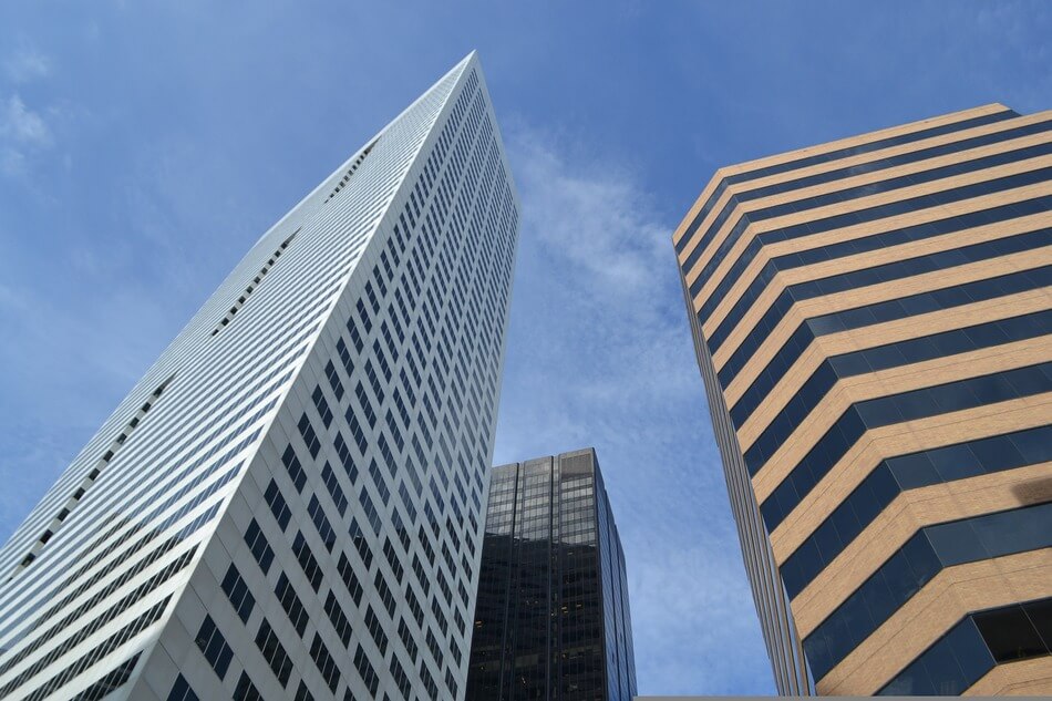 Black film for windows on 2 skyscrapers